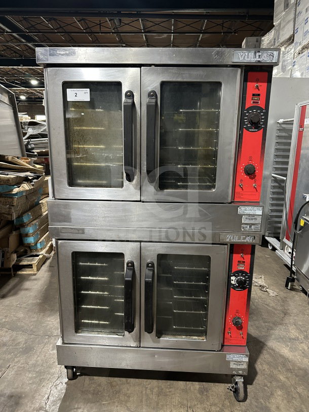 Vulcan VC4GD-11D150K double stacked stainless steel gas convection oven on casters, Energy Star certified, with wired rack.