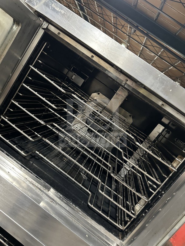 Vulcan VC4GD-11D150K stainless steel gas convection oven, Energy Star certified, includes wired oven racks, on casters.