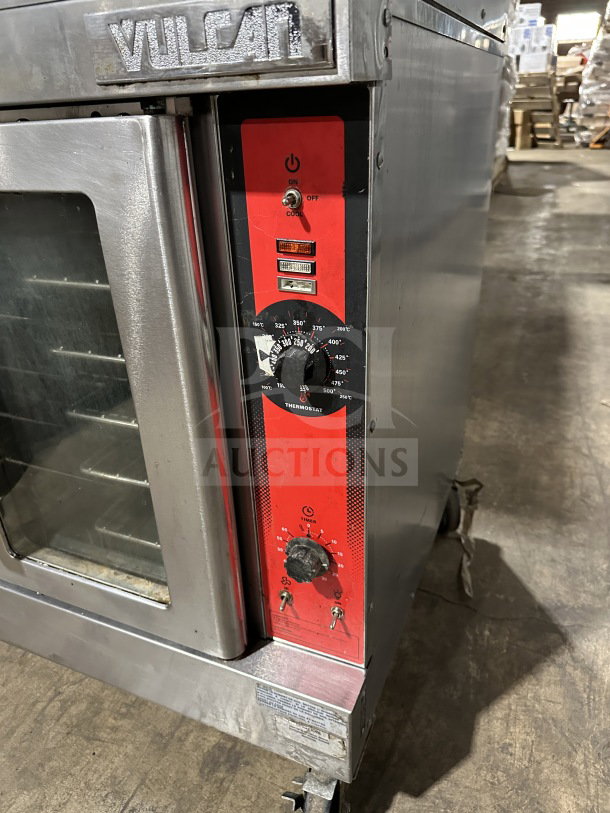 Vulcan VC4GD-11D150K stainless steel double-stacked convection oven, gas-powered, Energy Star certified, on casters.