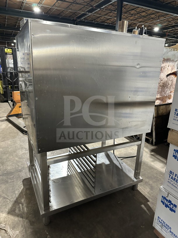 Electrolux Air-O-Steam stainless steel combi convection oven, model A0S102GCP1, natural gas, 120V, with open storage below.