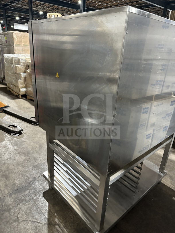 Electrolux Air-O-Steam Combi Oven, Model A0S102GCP1, stainless steel, natural gas, with open storage, on legs, good condition.