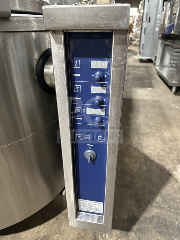 Electrolux ProThermetic Sprint gas tilting boiling pan, model CKU5HOEOOOO, 120V, stainless steel, on legs, with control panel.