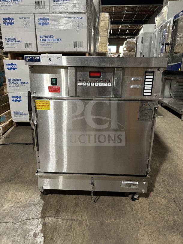 Commercial Winston Industries CAC507GR Cook-N-Hold Oven, stainless steel, electric, half size, on casters, model SN: 20010808-051.