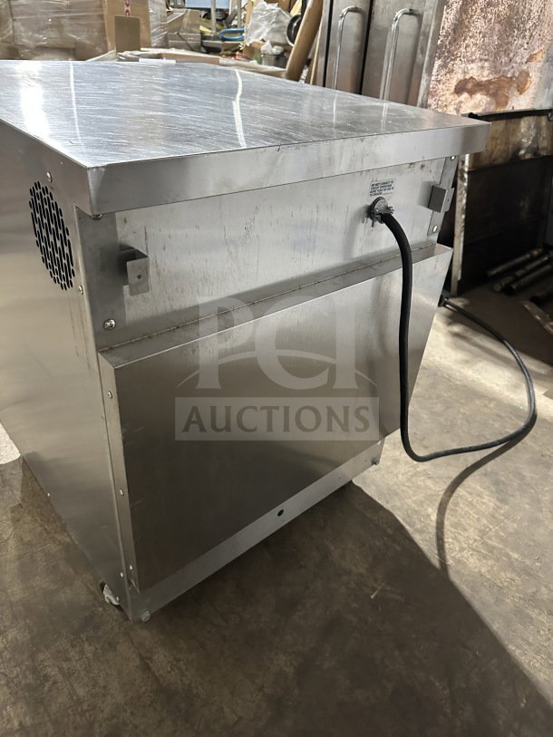 Winston Industries CAC507GR Stainless Steel Half Size Undercounter Cook-N-Hold Oven, Model CAC507GR, on casters, 208V.