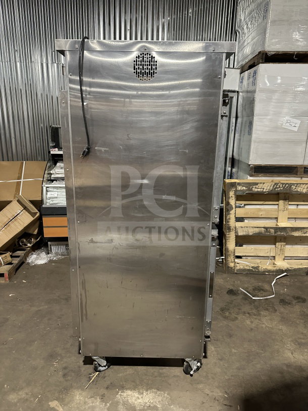 Stainless steel Winston Industries Cvap-4000A heated holding cabinet; pass-through doors, built-in pan racks, on casters. Model HA4522GE.