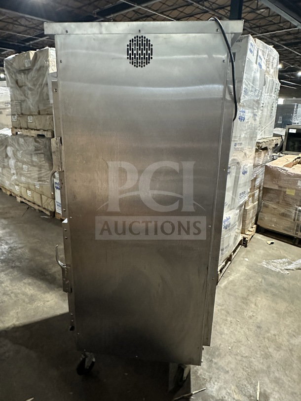Winston Industries Cvap-4000A stainless steel heated holding cabinet, model HA4522GE, on casters, with pass-through doors.