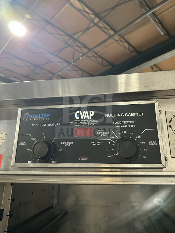 Winston Industries Cvap-4000A heated holding cabinet, model HA4522GE, stainless steel, electric, with pass-through doors and pan racks.