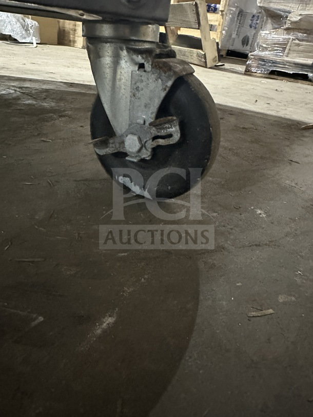 Caster wheel of Winston Industries Cvap-4000A Series heated holding cabinet. Model: HA4522GE, durable and mobile.