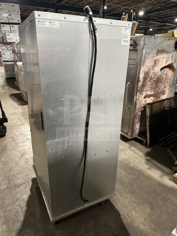 CresCor stainless steel insulated heated cabinet, model CABJ8369B1716. Features Dutch doors, wide pan slides, rubber bumper, and casters.