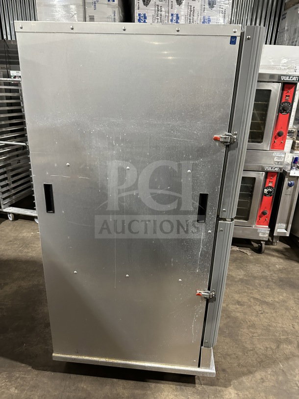 CresCor stainless steel heated cabinet, model CABJ8369B1716, with solid Dutch door, pan slides, rubber bumper, on casters.