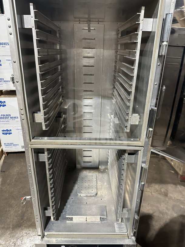 CresCor stainless steel Dutch door insulated heated cabinet, model CABJ8369B1716. Features pan slides, rubber bumper guard, casters.