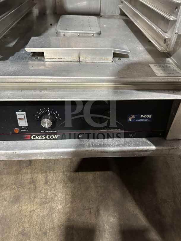 CresCor CABJ8369B1716 commercial stainless steel heated holding cabinet, Dutch doors, wide pan slides, on casters, 120V.