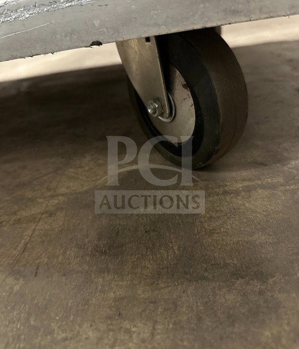 CresCor commercial heated cabinet caster, part of mobile unit, model CABJ8369B1716, stainless steel, durable rubber wheel.
