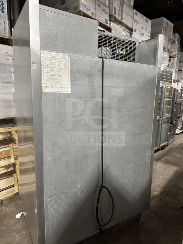 Traulsen Commercial Stainless Steel 2-Door Freezer G22012, poly coated racks, SN: T6898J07, 115V, 1 phase, on casters.