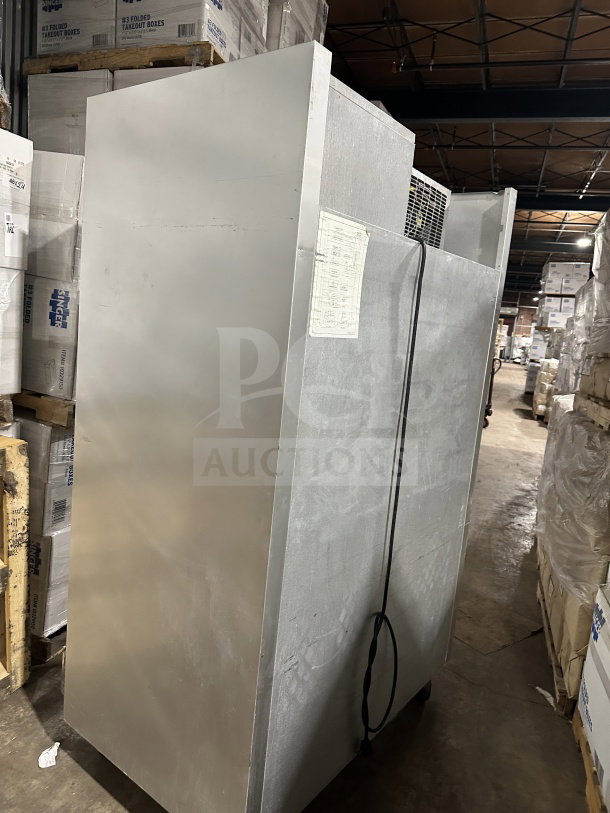 Traulsen G22012 stainless steel 2-door reach-in freezer, on casters, poly-coated rack, 115V, 1 phase, SN: T6898J07, commercial use.