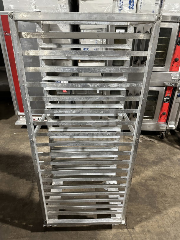 Commercial stainless steel heavy-duty welded pan rack with casters, 20-tier, used condition, ideal for transport/storage.