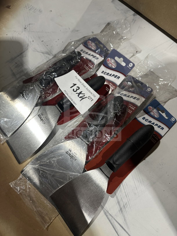 Brand new Winco Winware TKP-40 handheld scrapers, stainless steel blades, black slip-resistant polypropylene handles, in packaging.