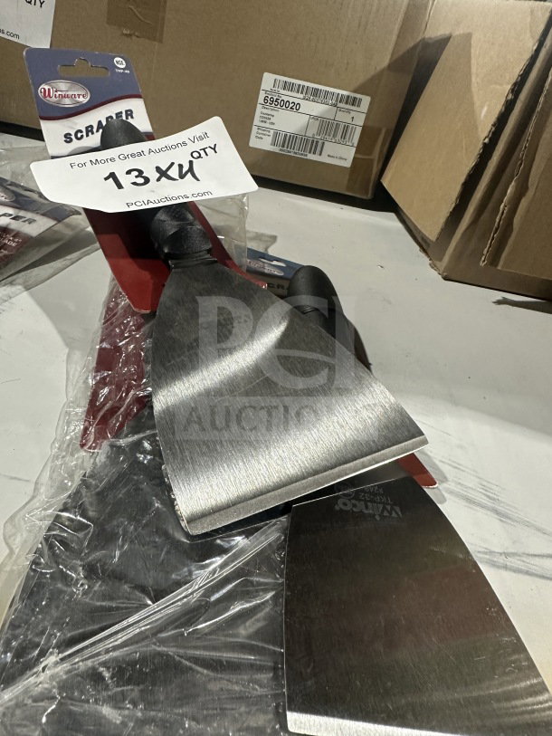 BRAND NEW Winco TKP-40 stainless steel scraper with black slip-resistant grip. Durable, professional kitchen tool.