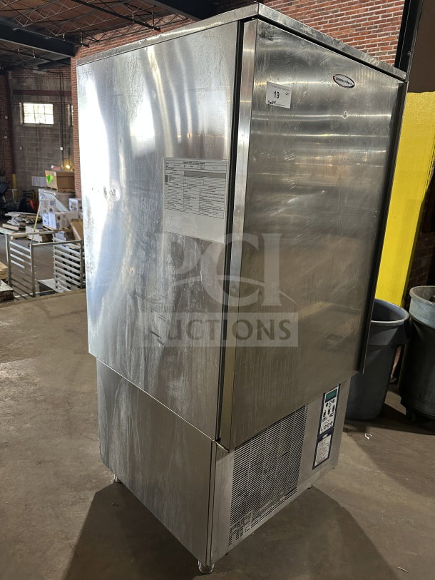 American Panel Hurri Blast Series stainless steel blast chiller, model AP12BCF1103, single door, 208V, 3 phases, on legs.