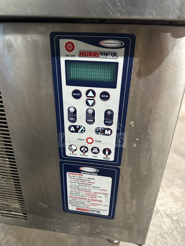 American Panel Hurri Chill Series stainless steel blast chiller, Model AP12BCF1103, control panel with operation guide, on legs.