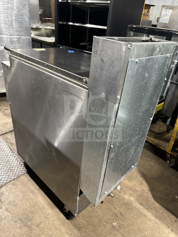 Imperial Commercial Stainless Steel Natural Gas Deep Fat Fryer with back splash, on casters; used condition.