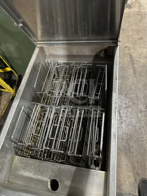 Imperial commercial stainless steel deep fat fryer, natural gas powered, with back splash and casters, excellent condition.