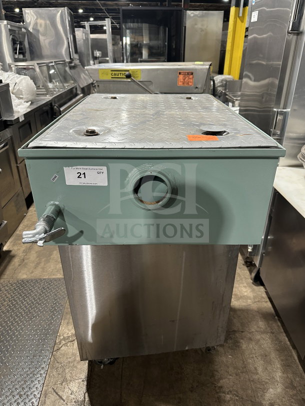 Rare Mifab MIGL20 grease interceptor on a custom mobile stainless steel cart with casters. Mint condition, auction item tag visible.