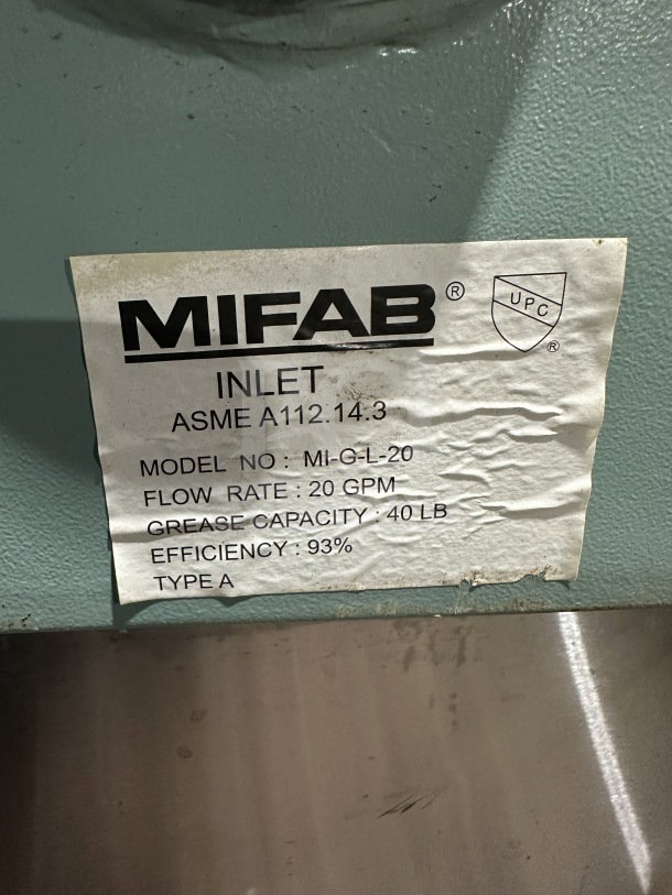 Mifab Model MIGL20 hydromechanical grease interceptor on stainless steel cart with casters. Flow rate: 20 GPM, 40 lb capacity.