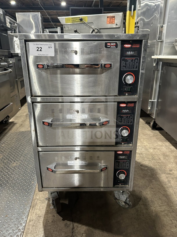 Hatco HDW3N stainless steel 3-drawer warmer, electric, freestanding, on casters, SN: 8736212133, 120V, used.