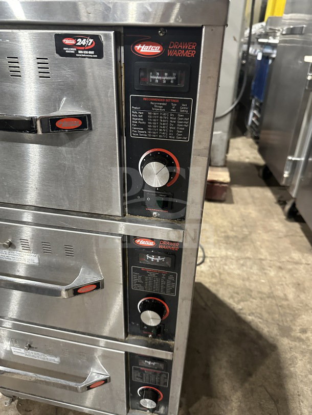 Hatco HDW3N stainless steel 3-drawer warmer, electric, 120V, on casters, with temperature settings and control panel.