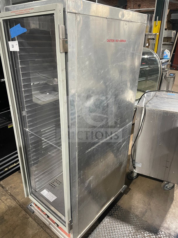 Avantco stainless steel heated holding/proofing cabinet, model 177HPU1836, with glass door, built-in pan slides, on casters.