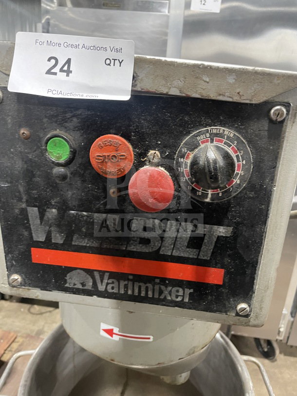 Welbilt Varimixer commercial floor mixer with dough hook, stainless steel bowl, control panel with stop button, timer dial.