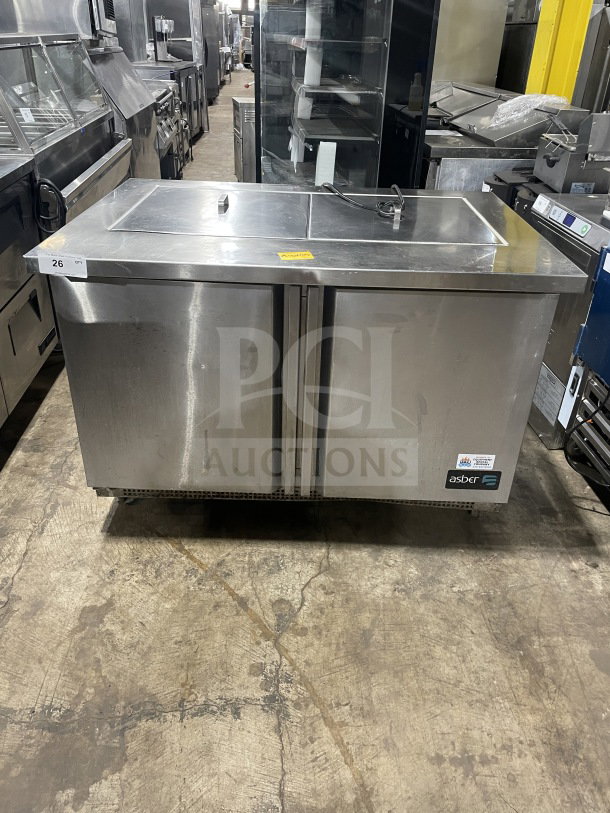 Asber 48" stainless steel electric 2-door prep table, model APTM4818, 115V, 1 phase, on casters, good condition.