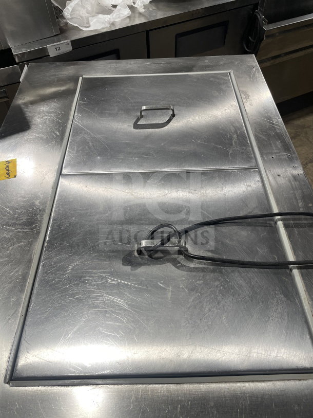 Asber 48" stainless steel prep table, model APTM4818, with 2 solid doors. Electric, 115V, 1 phase, on casters.