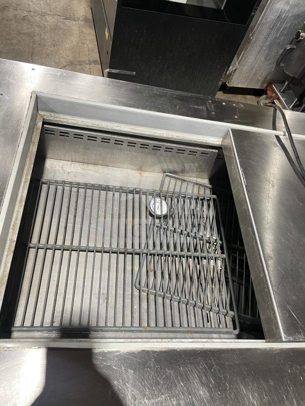Asber 48" stainless steel sandwich prep table, Model APTM4818, with solid doors, electric powered, on casters.