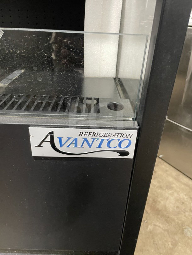BRAND NEW Avantco 193VOA48B black open-air merchandiser on casters with minor scratches; 115V, 1 Phase. Serial: 1704206100047.