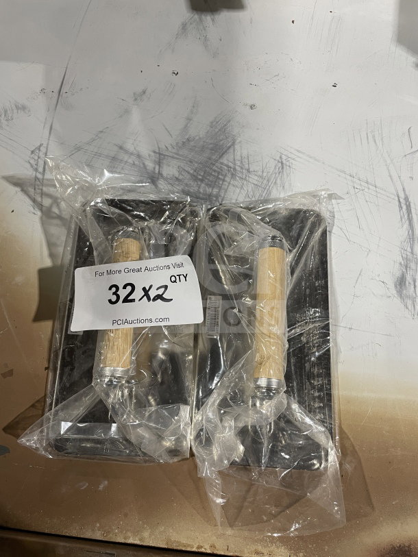 Brand new Vollrath 47708 steak weights, chrome plated, waffle-patterned grid, wooden handles, wrapped in plastic.