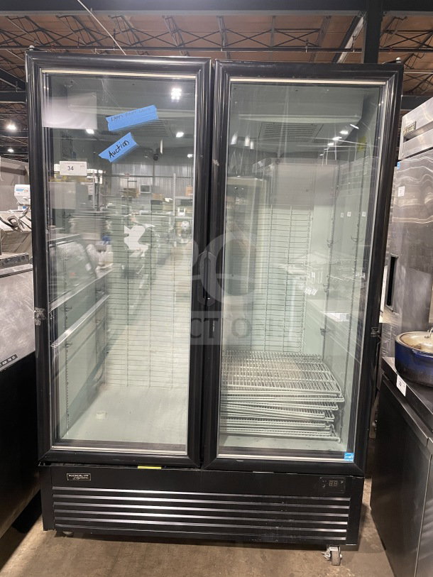 Kool-It LX46FB commercial freezer, black, double glass doors, reach-in, poly-coated wire rack, on casters, 115V, 1 phase.