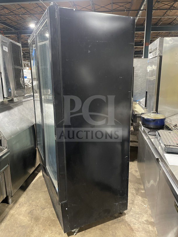 Kool-It commercial double glass door freezer, black, model LX-46FB, on casters, poly-coated wired rack, 115V, 1 phase.