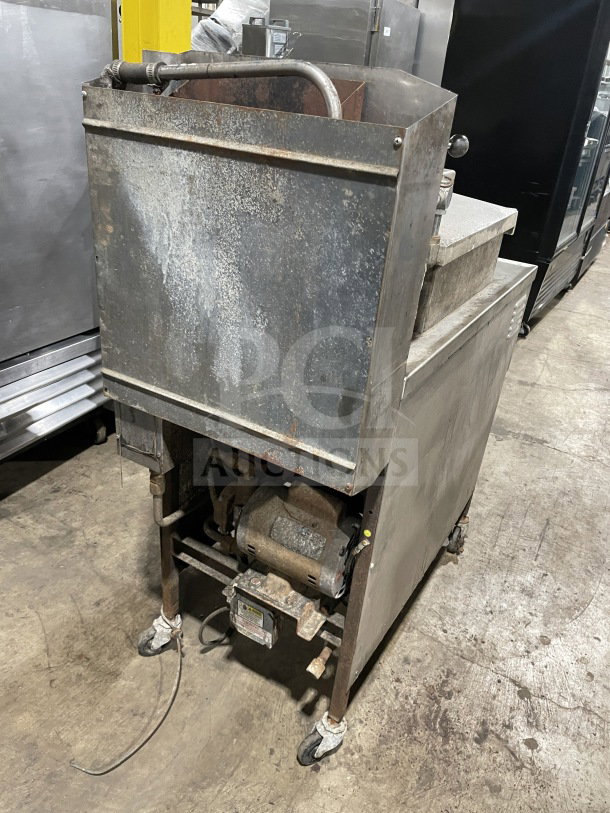 Henny Penny 600RB gas pressure fryer, stainless steel, floor model on casters, used condition.