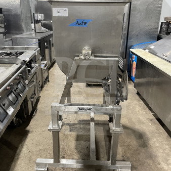 Leland Southwest HD100DA90 stainless steel meat mixer with tilting, counter-rotate action, on casters, in used condition.