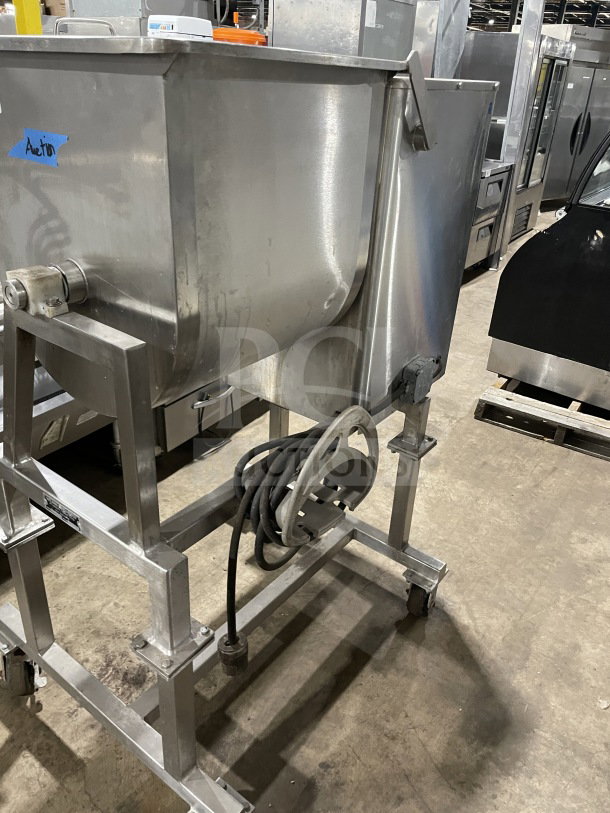 Leland Southwest HD100DA90 stainless steel meat mixer with tilting, double action counter-rotate, on casters. Model: HD100DA90.