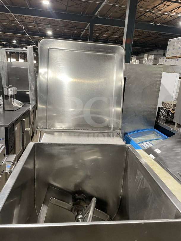 Leland Southwest HD100DA90 stainless steel meat mixer with tilting feature. Heavy-duty, double action, on casters.