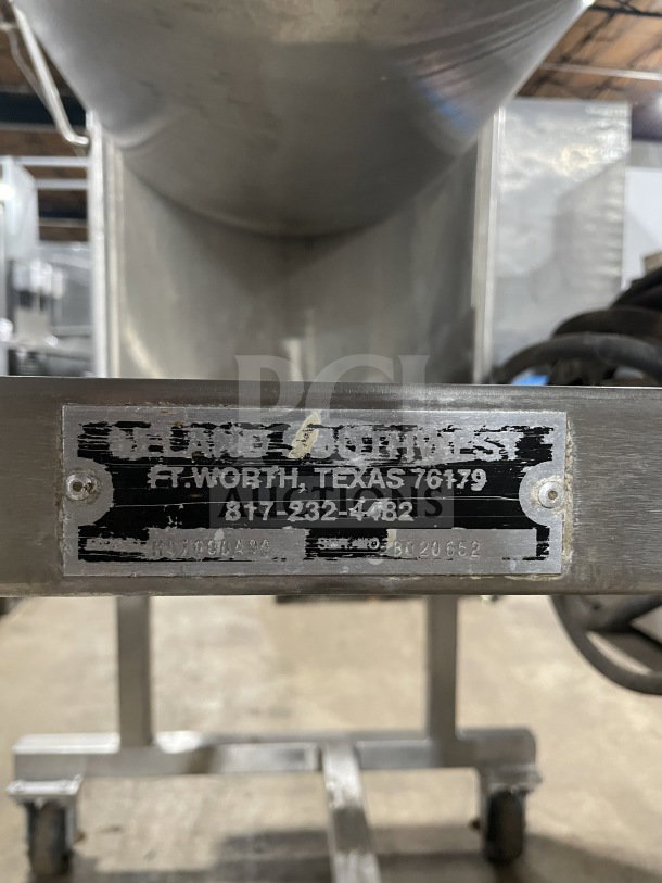 Leland Southwest HD100DA90 stainless steel meat mixer with tilt, double action, counter-rotate, on casters, SN: B0206562.