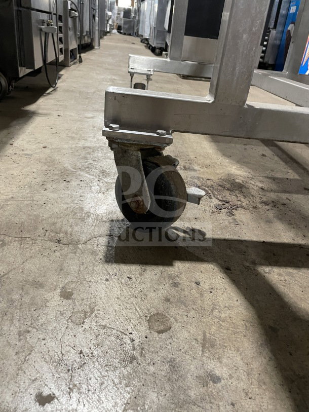Stainless steel Leland Southwest meat mixer with casters, Model HD100DA90. Tilting, double action, heavy-duty.