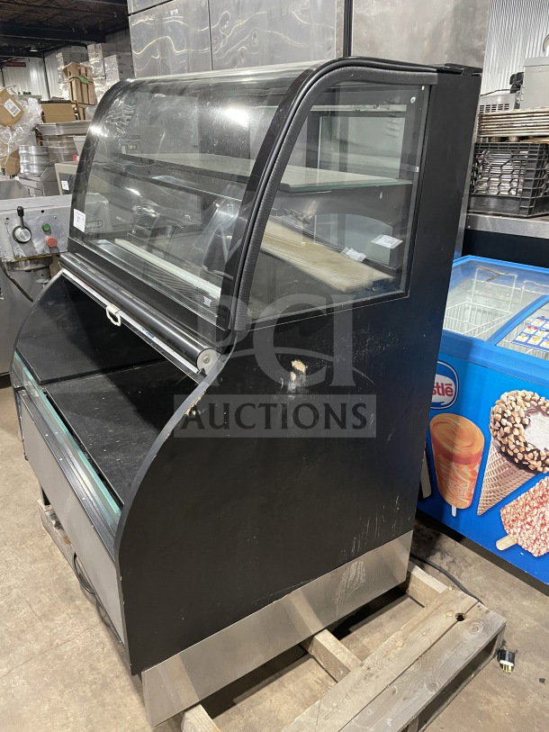 Structural Concepts 39" Harmony Series HMBC3 refrigerated merchandiser in stainless steel and black, dual service, used condition.