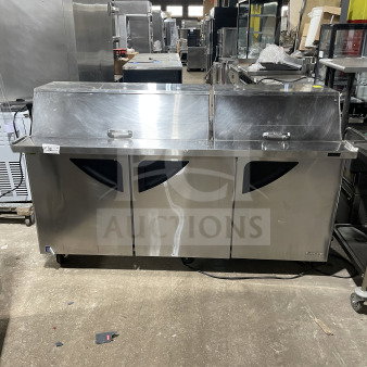 Turbo Air TST-72SD-30-N 3-door stainless prep table; refrigerated, bain marie style, chrome rack, cutting board, casters.