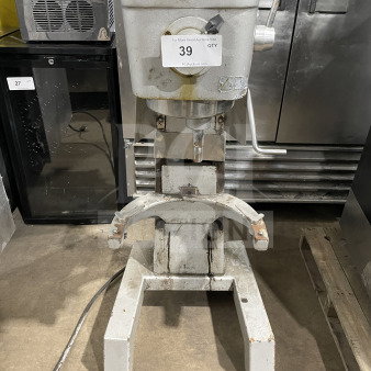 Uniworld commercial stainless steel planetary mixer in fair condition, visible wear. Tag shows auction number 39.