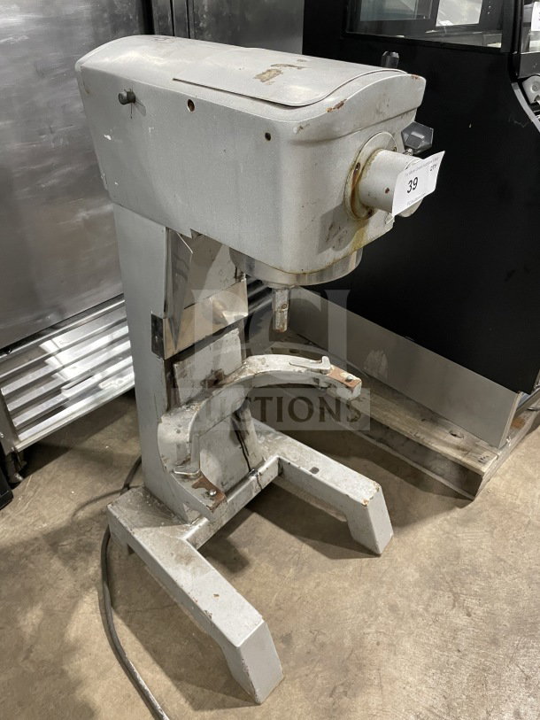 Uniworld Commercial Stainless Steel Planetary Mixer in used condition, featuring visible rust and wear.