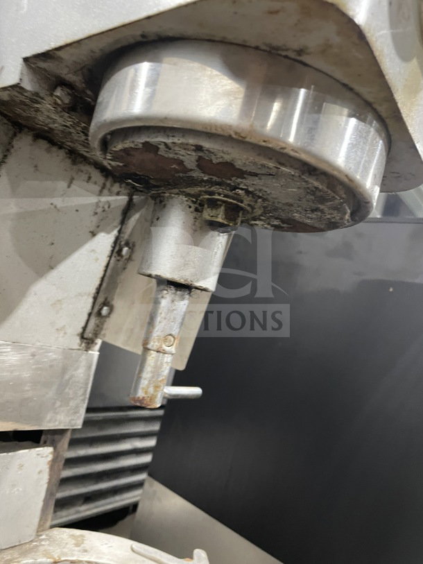 Uniworld Commercial Stainless Steel Planetary Mixer, visible rust and wear, used condition.